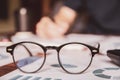 vintage glasses,on books stack in public library book, Studying examining. Tutor books with friends. Young students campus helps