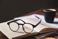 vintage glasses,on books stack in public library book, Studying examining. Tutor books with friends. Young students campus helps