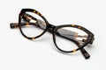 Vintage glasses leopard painted isolated on white background. Retro glasses cat`s eye shape top view Royalty Free Stock Photo