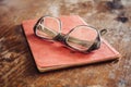 Vintage glasses on old book Royalty Free Stock Photo