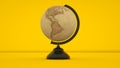 Vintage globe isolated on yellow background. 3d rendering Royalty Free Stock Photo