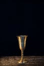 Vintage goblet for wine on black background