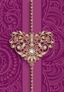 Vintage gold jewellery heart on pink background