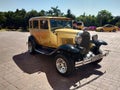 Vintage golden car near the beach