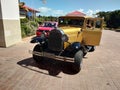 Vintage golden car near the beach