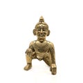 vintage golden figure of crawling baby lord krishna also called gopal Royalty Free Stock Photo
