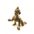 vintage golden figure of crawling baby lord krishna also called gopal Royalty Free Stock Photo