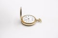 Vintage golden pocket watch isolated on a white background. Royalty Free Stock Photo