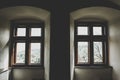 Symmetrical arch windows of an ancient gothic building