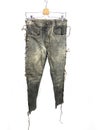 Vintage gray leather motorcycles pants with scraches Royalty Free Stock Photo