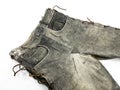 Vintage gray leather motorcycles pants with scraches Royalty Free Stock Photo