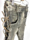 Vintage gray leather motorcycles pants with scraches Royalty Free Stock Photo