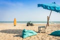 Vintage green ATV on the sandy beach. Quad ATV all terrain vehicle parked on beach, Motor bikes ready for action with summer sun Royalty Free Stock Photo