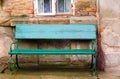 Vintage green bench and broom