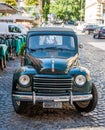 Vintage green car on street in Trastevere Royalty Free Stock Photo