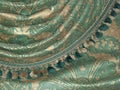 Vintage green and gold tassled velvet curtains background close-up