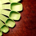 Vintage green measuring spoons. Royalty Free Stock Photo