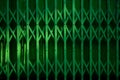 Vintage green metal slide door and the shadow. Royalty Free Stock Photo
