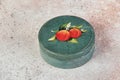 Vintage green storage box on concrete background