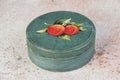 Vintage green storage box on concrete background