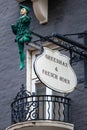 Vintage Greenman and French Horn Sign in London, UK