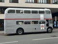 A vintage grey double-decker bus or double-deck bus in London, England