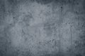 Vintage grey painted plaster concrete wall background. Dark edge