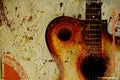 Vintage grunge background with guitar