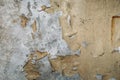 Vintage grunge background texture of old concrete wall with cracked weathered paint and traces of water streaks Royalty Free Stock Photo