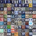 Vintage grunge square metal plates with street address numbers  arranged from 1 to 100 Royalty Free Stock Photo