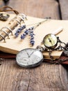 Vintage grunge still life with pocket watch Royalty Free Stock Photo