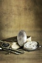 Vintage Grunge Still Life with Pocket Watch Old Book and Brass K