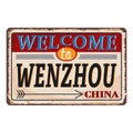 Vintage grunge Wenzhou Welcome to China rusted plate on white background