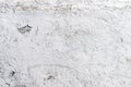 Vintage and grunge white paint peeling off from concrete wall Royalty Free Stock Photo