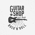 Vintage Guitar Shop logo.