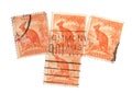 Vintage half penny orange kangaroo postage stamps from Australia.