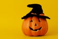Vintage halloween pumpkin objects with hat black on yellow backgrounds