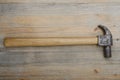 Vintage hammer on a wooden surface