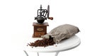 Vintage hand coffee grinder. bag of scattered coffee beans Royalty Free Stock Photo