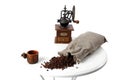 Vintage hand coffee grinder. bag of scattered coffee beans Royalty Free Stock Photo