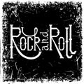 Vintage hand drawn lettering rock and roll on grunge background. Royalty Free Stock Photo