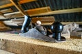 Vintage hand planer on the Board with sawdust in the carpenter shop