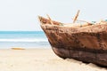 Vintage handmade fisherman boat with fishing nets on the beach Royalty Free Stock Photo