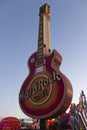 Vintage Hard Rock Cafe giant guitar sign seen at dusk in the Neon Museum open-air exhibit, Las Vegas