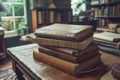 Vintage Hardback Books Stacked on Wooden Table in Classic Library Room with Shelves of Old Literature Texts Royalty Free Stock Photo