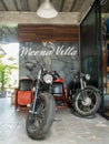 Vintage Harley motorcycle display in front of the resort in Nakhon Nayok.