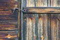 Vintage hasp on wooden door Royalty Free Stock Photo