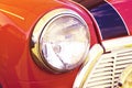 Vintage headlight red car Royalty Free Stock Photo