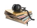 Vintage headphones on the stack of vinyl records