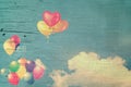 Vintage heart colorful balloon on blue sky